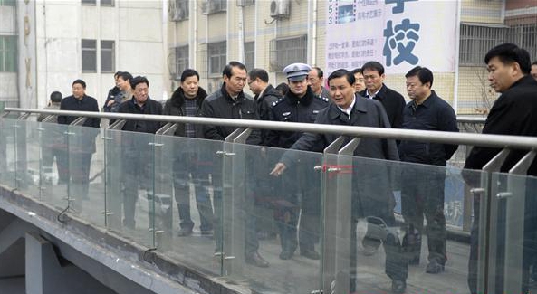 武國定：善始善終精益求精 圓滿完成六項惠民實事建設任務