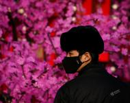 2017年1月3日，北京，一名戴著口罩的安保人員。攝影：Thomas Peter